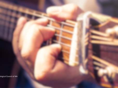 Playing guitar
